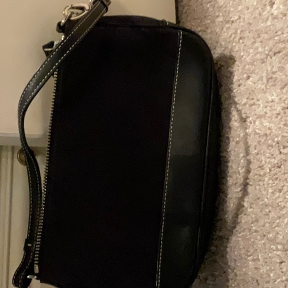 Vintage Coach black logo mini purse. Zip closure.